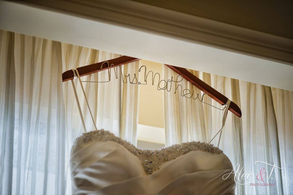  brides dress on hanger in wedding picture