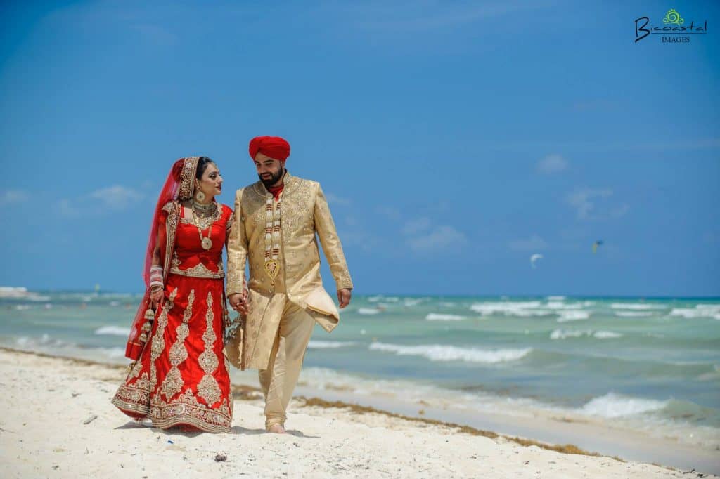 couple on the beach with Indian Wedding 