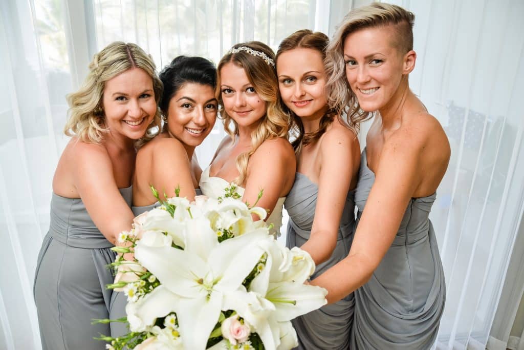 Bridesmaids with a wedding bouquet 