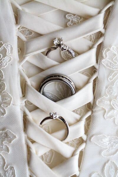 8 rings within the brides dress