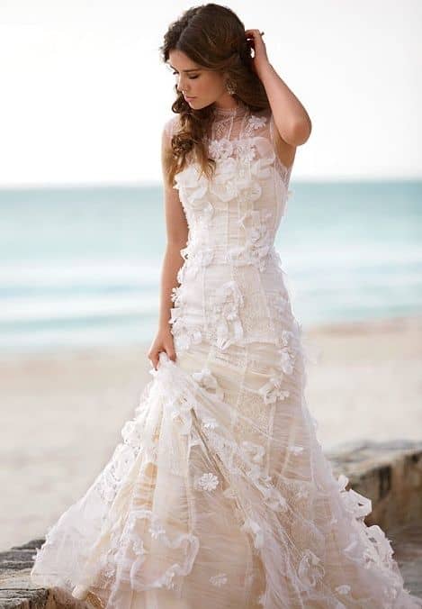 Bride on the beach in wedding dress 