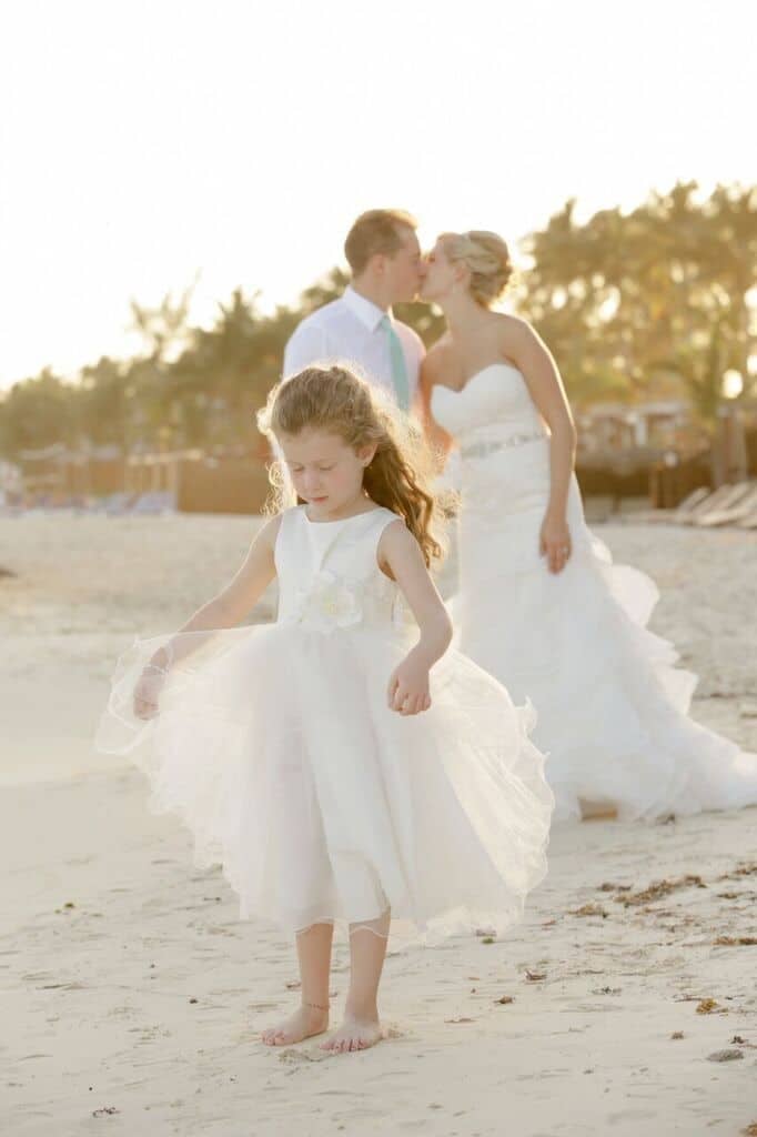  flowergirl with couple on the beach 