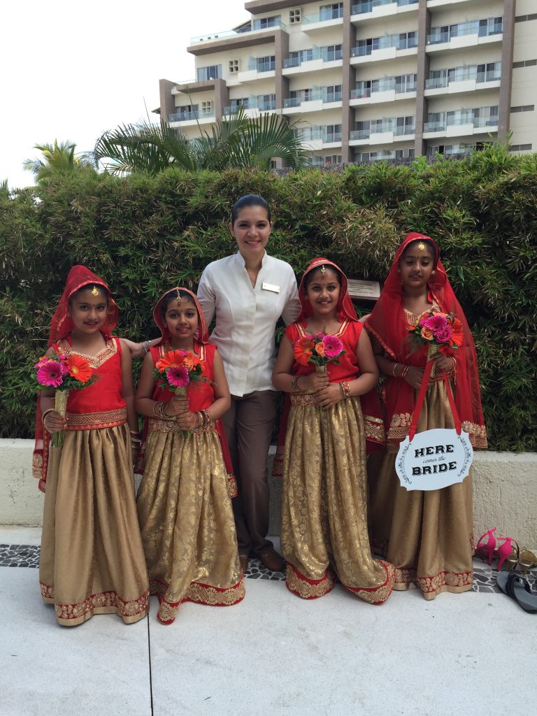 3 indian children with wedding coordinator