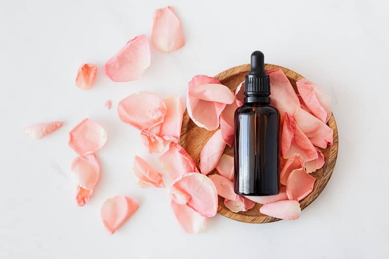 Beauty face oil with pink petals