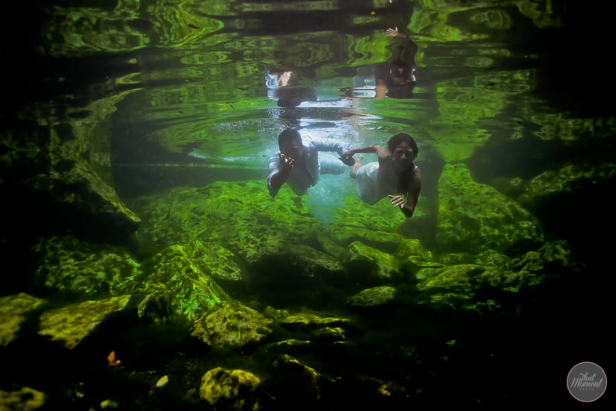  bride and groom in underwater cenotes session