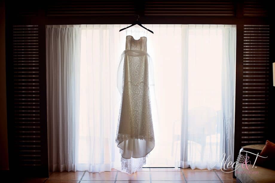 wedding dress hanging up and beautiful 