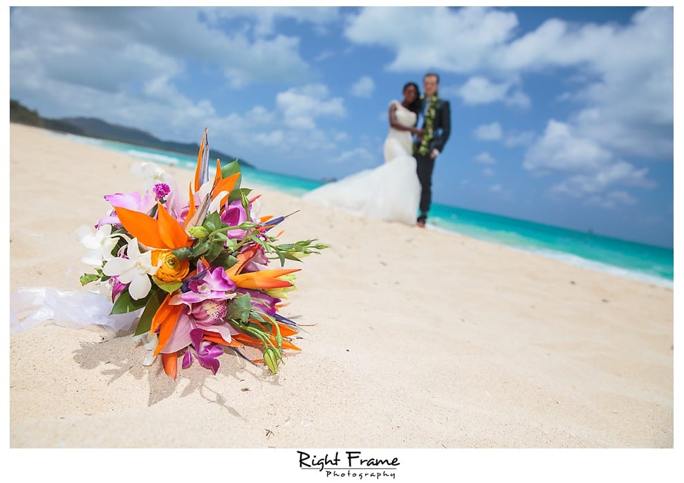 9 Hawaii-Destination-Wedding flowers on the beach 