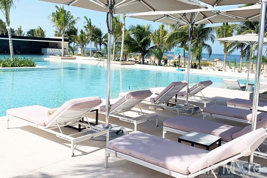 Atelier-Playa-Mujeres-Luxury-Resort-lounge-chairs-by-main-pool.jpg