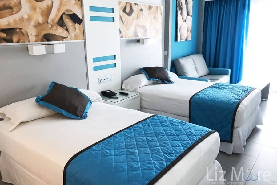 Hotel-Riu-Dunamar-Costa-Mujeres-double-bed-bedroom.jpg