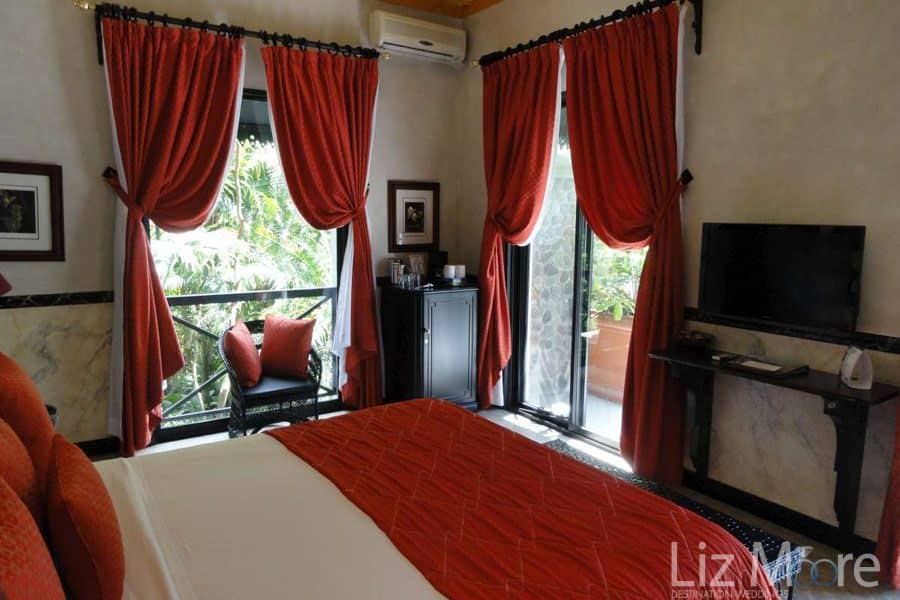 Villa-Caletas-Hotel-red-decor-bedroom.jpg